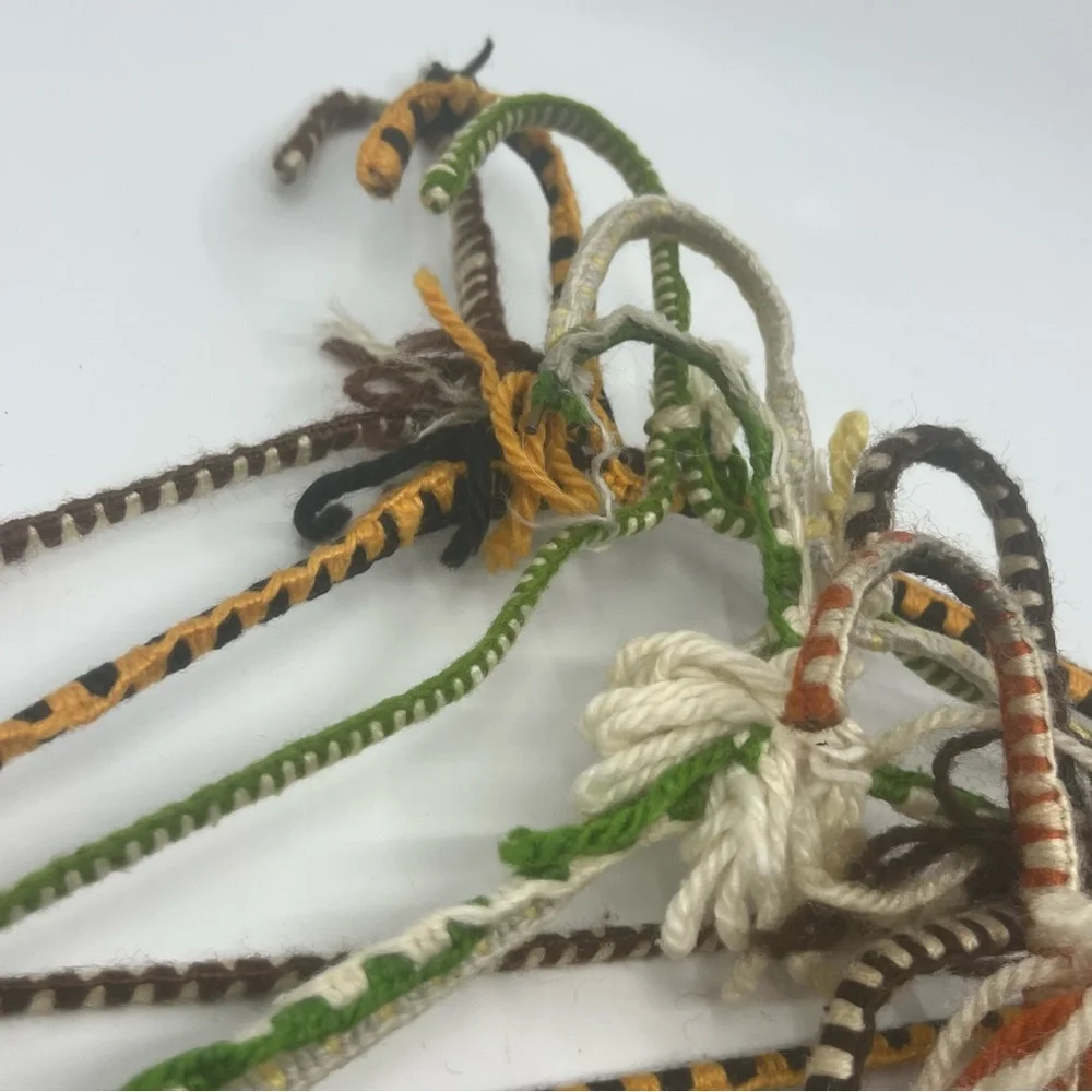 7 vintage wire hangers wrapped in yarn multi color as is